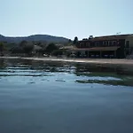Dimitris Messongi *